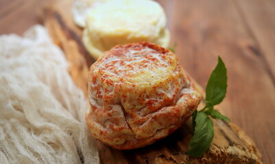 round shape goat cheese closeup selective focus, farm cheeses.