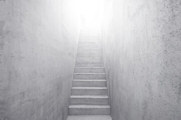 Fototapeta na wymiar Concrete staircase leading up to bright light