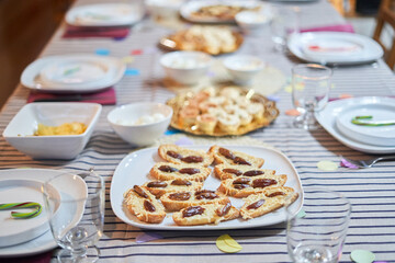 Table with food and canapes prepared for the party