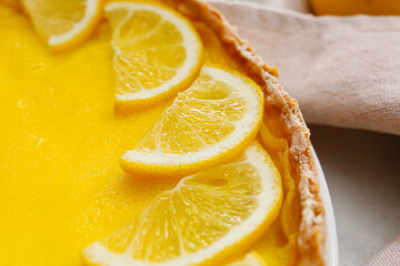 Fototapeta na wymiar Tasty lemon tart on table, closeup