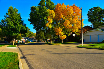 Modern homes line the streets of this comfortable clean neighborhood in growing Bismarck, North...