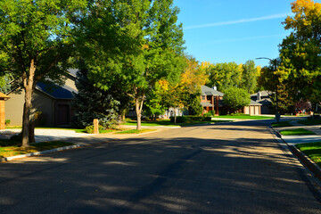 Modern homes line the streets of this comfortable clean neighborhood in growing Bismarck, North Dakota.