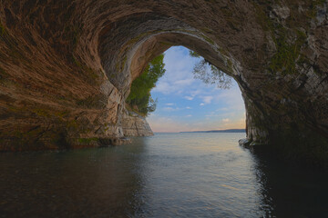 Landscape at dawn, of the interior of Cathedral Sea Cave, Grand Island, Lake Superior, Michigan’s Upper Peninsula, USA