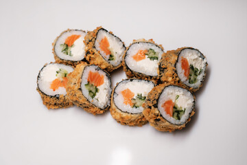 Sushi roll with salmon. Traditional Japanese cuisine.
