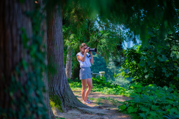 Naklejka na ściany i meble one photographer in the Botanical Garden of Batumi
