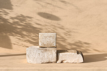 Beige stone podium display. Platform for product brand presentation cosmetic. Scene with sunshade shadow of background. 3d rendering illustration.