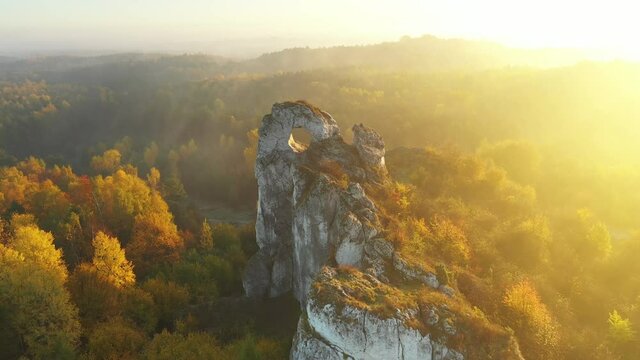 Okiennik wielki rock during autumn foggy sunrise - Jura Krakowsko-Czestochowska - Poland
