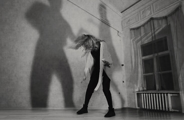 Contemporary dance dancer . Dance with your shadow, dance with your dream, past and future