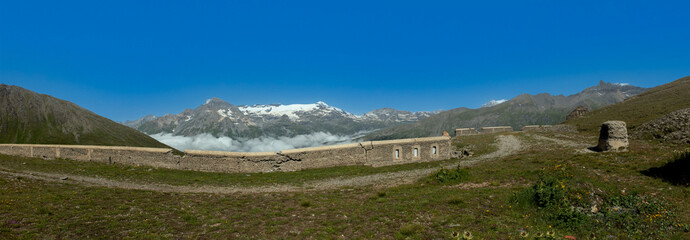 panoramic view of the Vanoise massif from the Turra Fort above the Mont Cenis dam in the French Alps