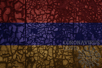 flag of armenia on a old metal rusty cracked wall with text coronavirus, covid, and virus picture.