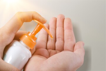 Person using alcohol gel clean wash hand sanitizer anti virus bacteria