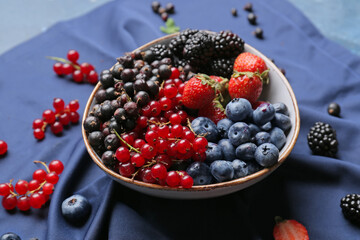 Composition with different ripe berries on table, closeup