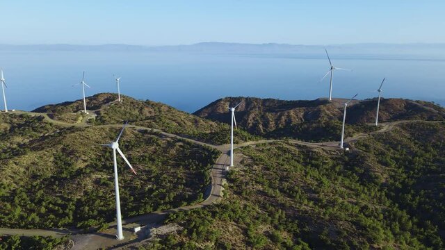 Wind turbines no rotation in windless conditions in wind power farm. Black out and energy crisis