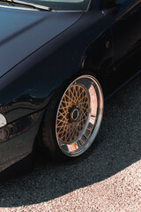 Golden alloy rim of a modified car