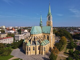 Archdiocese of Lodz.Catholic church in autumn scenery.Metropolitan Area.Drone photo ,top view  - obrazy, fototapety, plakaty