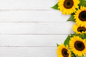 Sunflowers on white wooden background. Valentine's, womens, mothers day, easter, birthday or...