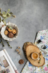 coffee time with almond and chocolat biscuits reading a magazine