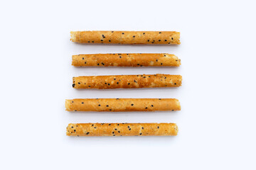 Crispy egg rolls on white background.
