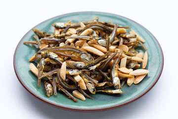 Almonds Mixed Anchovy in plate on white background.