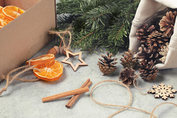 Zero waste and eco friendly christmas concept. Natural decorations and branches of a Christmas tree...