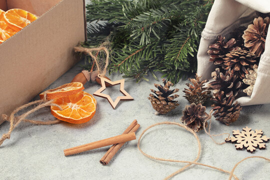 Zero waste and eco friendly christmas concept. Natural decorations and branches of a Christmas tree on the table