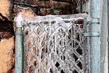 Ice covered rusty gate in Monroe Louisiana