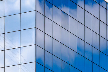 Glass facades of buildings. Element of architecture. Textured background. Blank for design....