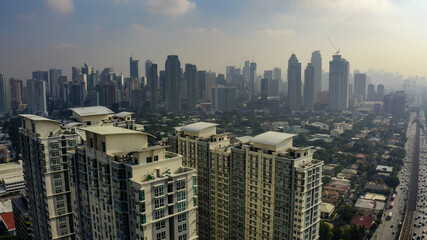 Fototapeta na wymiar Aerial city skyline with condos in the foreground.