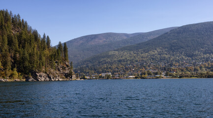 Fototapeta premium Scenic View of Kootenay River. Sunny Fall Season Morning. Located in Nelson, British Columbia, Canada.