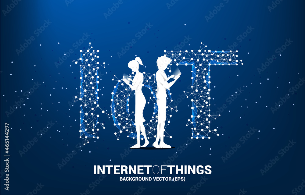 Aufkleber Silhouette of man and woman use mobile phone standing and Polygon dot connect line shaped IoT wording . Concept for telecommunication and internet of things.