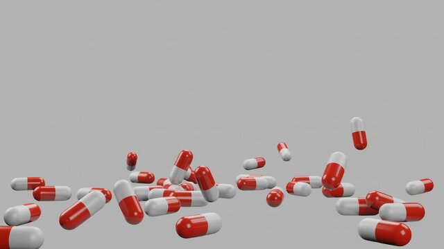 3D render. tablets in capsules of red and white color fall overnight. health concept