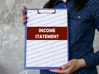 Business concept meaning INCOME STATEMENT with phrase on the page.