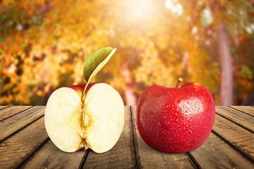Naklejka na ściany i meble Fresh ripe apples on the wooden desk