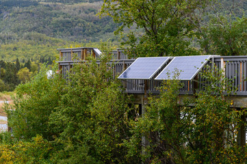 Solar panels in the fall landscape of Katmai National Park, Alaska
