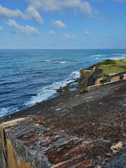 Ocean view with a fortification wall, Castillo de San Cristobal, San Juan, Puerto Rico - obrazy, fototapety, plakaty