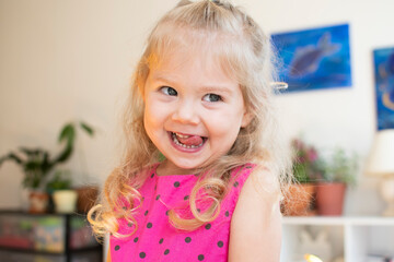 Funny cute caucasian child. toddler face expression. Mischievous kid