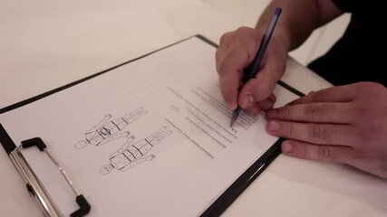 Completing a medical chart in a beauty medical center closeup.