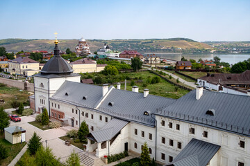 Top view of the medieval Assumption Monastery, church domes and the Volga River in Sviyazhsk, Russia