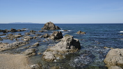 Fototapeta na wymiar beautiful rocky seashore, Sasagawanagare