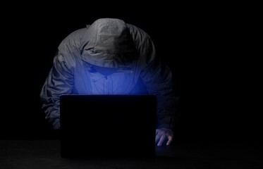 concept of hacking and malware Hackers use abstract laptops to steal Internet data