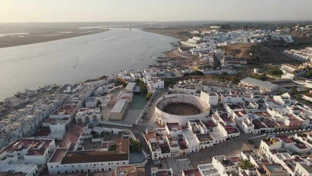 Aerial view Ayamonte Bullring downtown with Guadiana river and Portugal Background