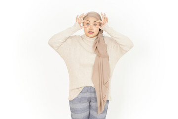 Trying open the eyes of Beautiful Asian Woman Wearing Hijab Isolated On White Background