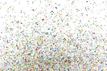 Small fragments of colorful paper pieces spill out in air as beautiful celebration flakes and vivid flares to entertain and decorate party