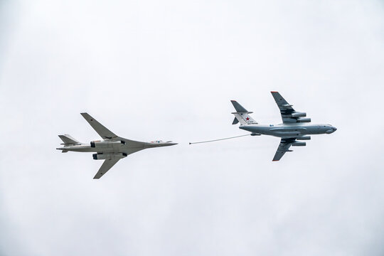 Moscow, Russia - May, 09, 2021: The group of supersonic strategic bomber of long-range aviation Tu-160 and flying tanker Il-78m fly over the Red Square