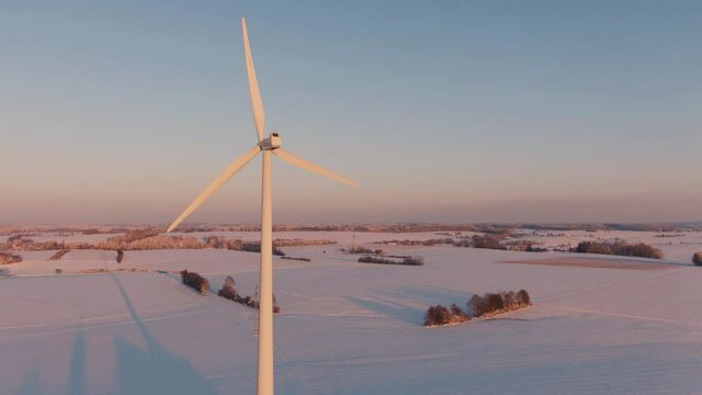Drone shot of a Windmill during a beautiful winter sunset