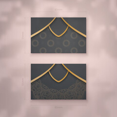 Business card template in black with Indian gold ornaments for your contacts.