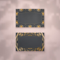 Business card template in black with Indian gold ornaments for your contacts.