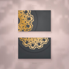 Business visiting card template in black color with mandala gold pattern for your contacts.
