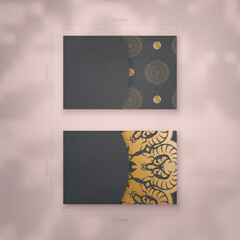 Black business card template with vintage gold pattern for your brand.