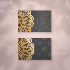 Business card template in black with vintage gold ornaments for your personality.